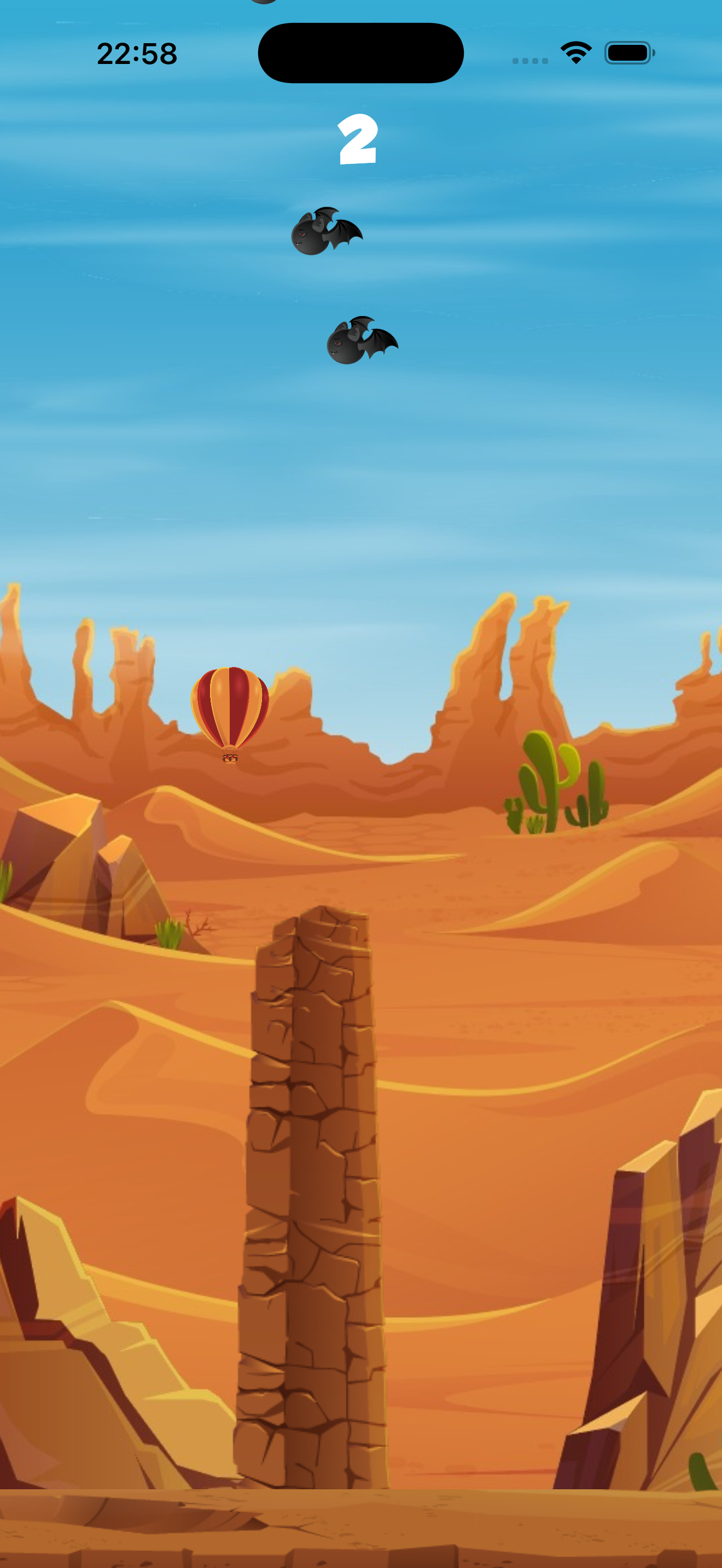 Sahara Jump gameplay - day mode with balloon navigating desert obstacles